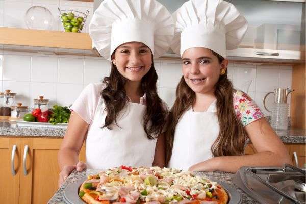 Kids Cooking Classes: Young chefs measuring ingredients