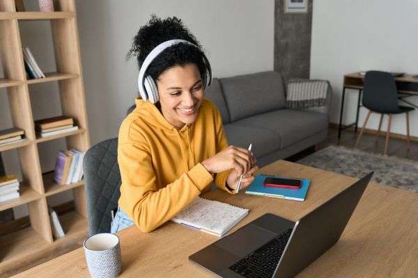 Triumphant moment: An adult showcasing newfound vocal skills in a group setting.