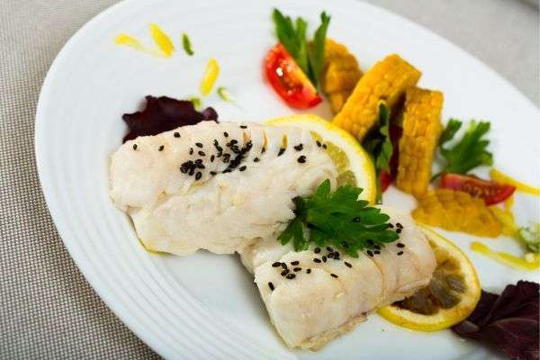 Beginner chefs learning culinary skills in a cooking class