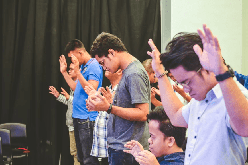 Youth actors from T3 Triple Threat performing in front of an audience