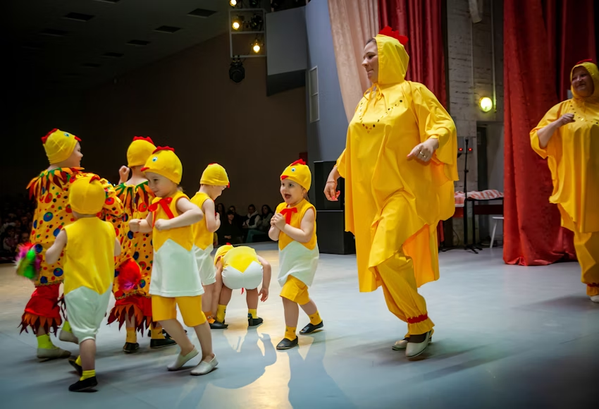 Students gaining teamwork experience through theater work rehearsal